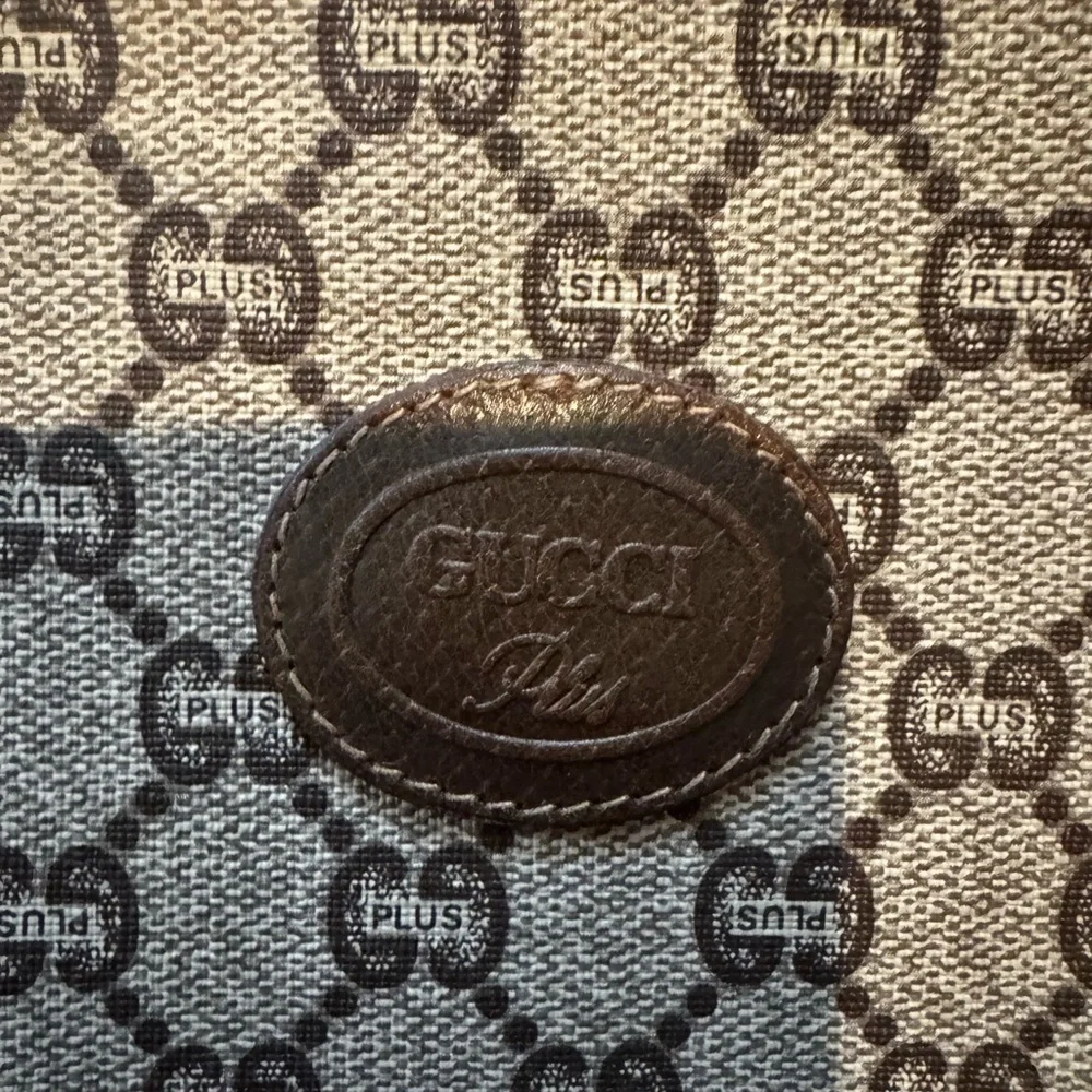 Gucci Plus Authentic Coated Canvas Monogram Pouch